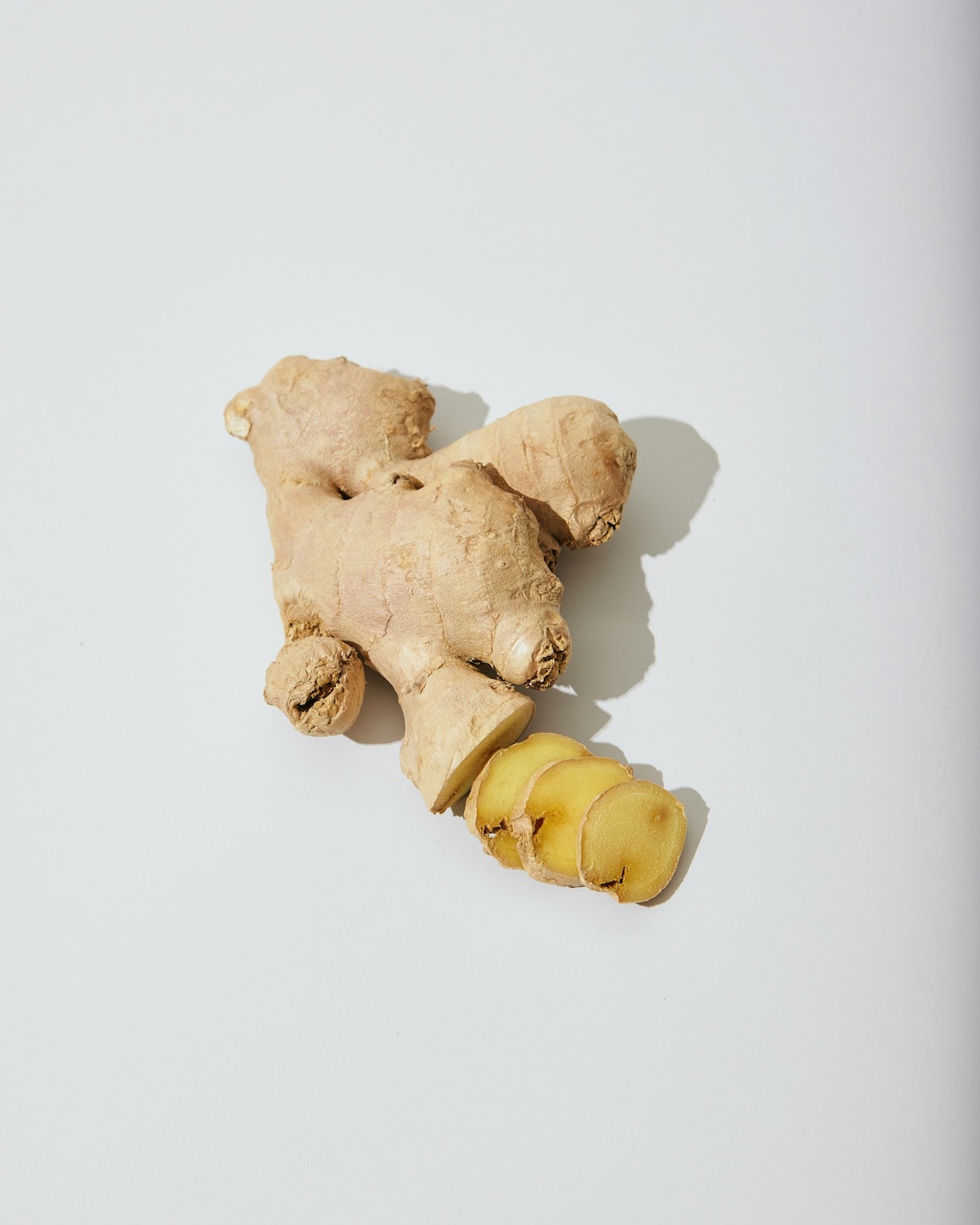 A piece of raw ginger on a table