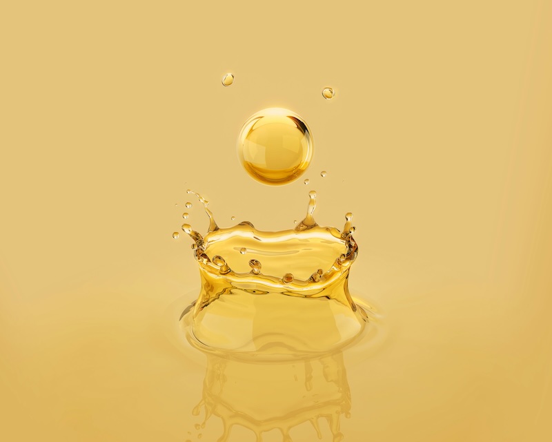 A drop of oil bouncing into liquid